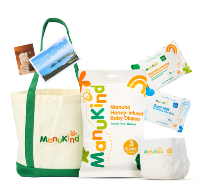 Manukind Size 3 baby diaper and wipes sample kit with 3 sample diapers, Manuka honey baby wipes, goat milk baby wipes, postcard and info brochure wrapped in Manukind tissue paper